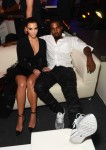 Kim Kardashian and Kanye West pose in the VIP Glamour area